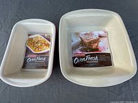 Two Good Cook Oven Fresh stoneware baking dishes side by side.