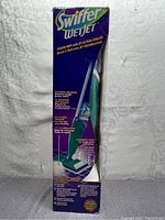 Front side of the Swiffer Wet Jet Power Mop box showing product image, brand, and key features.