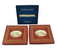 Photo shows three original boxes, two red for the wedding ornaments and one blue for the train ornament.