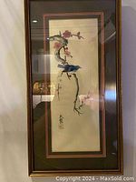 Full view of the framed Japanese silk painting featuring a blue bird and cherry blossoms.