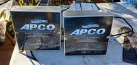 Front view of two APCO Fresh Air UV Machines showing branding and front panel details.