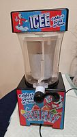 Front view of Icee slushie drink machine showcasing branded signage and dispensing tap