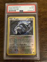 Front side of the 2016 Pokemon XY Lugia Reverse Foil #78 card in PSA graded slab badge showing EX-MT 6.