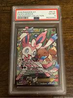 Front view of Pokemon Sylveon EX card graded PSA 6 with detailed full art showing Sylveon and Eevee.