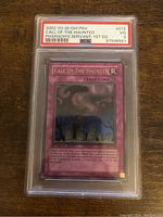 Front view of YuGiOh 2002 1st Edition Call of the Haunted card graded PSA 3 in protective case.