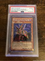 Front view of the Breaker the Magical Warrior card with PSA grade and details visible.
