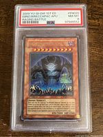 Front side of the 2009 YuGiOh! 1st Edition Earthbound Immortal Ccapac Apu card with PSA grading label in plastic case.