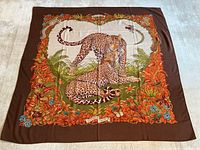 Entire shawl laid flat showing full print and border