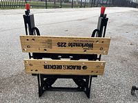 Top view of the Black & Decker Workmate 225 showing the two wooden clamping jaws with branding and holes for clamping.