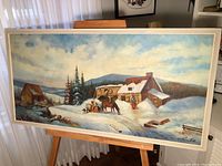Full view of winter scene painting on canvas showing house, horse with sled, dog in snow, and background hills under cloudy sky.