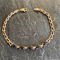 Bracelet laid flat showing full length, link design and clasp