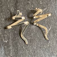 Front view of both zig zag earrings laid flat