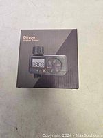 Closed box showing Diivoo water timer on front with digital display and dial.