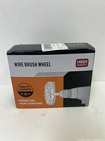 Box packaging for wire brush wheel attachment showing usage for derusting and paint removal with hand drill illustration.