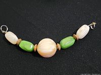 Front view of Tibetan necklace showing bead arrangement and clasp