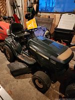 Front-side view showing overall condition, deck and body panels