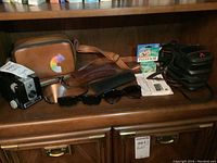 Overview of all items arranged on wooden shelf