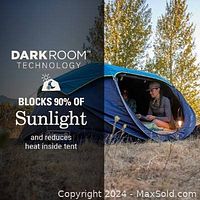 Image showing the tent in use at night with the Dark Room technology blocking sunlight and reducing heat inside.