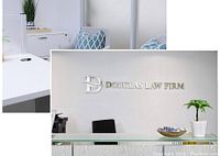Reception area with Douglas Law Firm logo on wall and modern desk