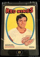 Front of the 1971-72 O-Pee-Chee Marcel Dionne Detroit Red Wings hockey card showing player image, team and details.