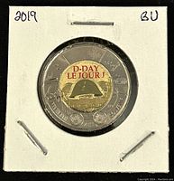 Obverse side of 2019 Canadian $2 twoonie showing the colored D-Day commemorative design with helmet and red text, in protective holder marked '2019 BU'.