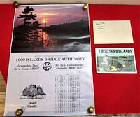 Photo of the 1985 wall calendar showing a sunset over Boldt Castle, with calendar dates for the year and contact information.