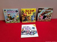 Photo showing four vintage Disney items: three storybook and record sets for Peter Pan, The Jungle Book, Mary Poppins, plus a Best of Disney lyric book.