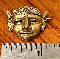 Front view with ruler showing approximately 1" width