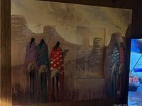 Full view of large canvas art showing five Native American women on horseback with desert mesas in background, signed by artist MAX.