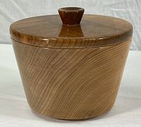 Photo of the closed vintage myrtle wood bowl showing the natural wood grain and fitted lid with knob.
