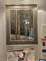 Full view of framed serigraph artwork titled "Alone" depicting a forest scene with vertical tree trunks.
