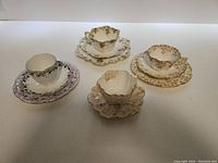 Overview of all four Shelley bone china sets arranged on countertop