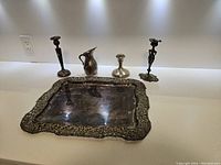 Full set of five vintage silver plated formal dining table pieces displayed on a white surface.