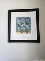 Framed serigraph print hanging on white wall, showing full artwork with black frame and white mat.