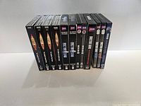 Photo showing the spines of multiple Doctor Who DVD boxed sets from series 1 to 11 in excellent condition.