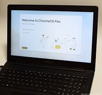 Asus laptop screen showing Chrome OS Flex welcome screen.