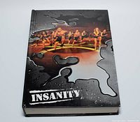 Front cover of Insanity workout DVD case showing group exercising on cover.