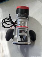 Photo showing the full router with Masterworks branding and visible handles.