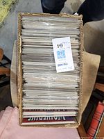 Top view of all comics in protective sleeves packed in a cardboard box