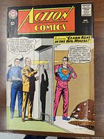 Front cover of Action Comics No. 323 dated April 1965, showing Clark Kent opening his shirt to reveal Superman suit inside a prison cell.