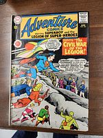 Front cover of Adventure Comics No. 333 showing Superboy and Legion of Super-Heroes in action with story title 'The Civil War of the Legion'.