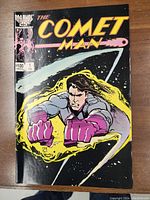 Front cover of The Comet Man No. 1 comic in good condition with a superhero flying through space illustration.