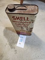 Front view of Shell household cleaner tin showing branding and condition.