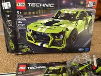 Box front image showing LEGO Technic 42138 Ford Mustang Shelby GT500 with 544 pieces, recommended age 9+ and pull-back motor feature.