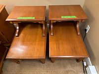 Two Mid-Century Vilas two-tier end tables shown side by side, top view and front angled view, illustrating the maple wood construction and surface condition.