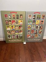 Two large framed wood prints with vintage baseball card prints shown upright on the floor against a wall