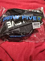 Photo showing PAW FIVE branded large dog harness sealed in original plastic packaging with tags visible.
