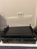 Front view showing rack shelf on top, Yamaha SPX90 II in middle and Ensoniq Mirage at bottom