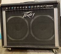 Front view of Peavey Renown 212 guitar amplifier showing speakers and control panel.