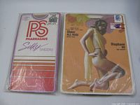 Front view of both sealed pantyhose packages